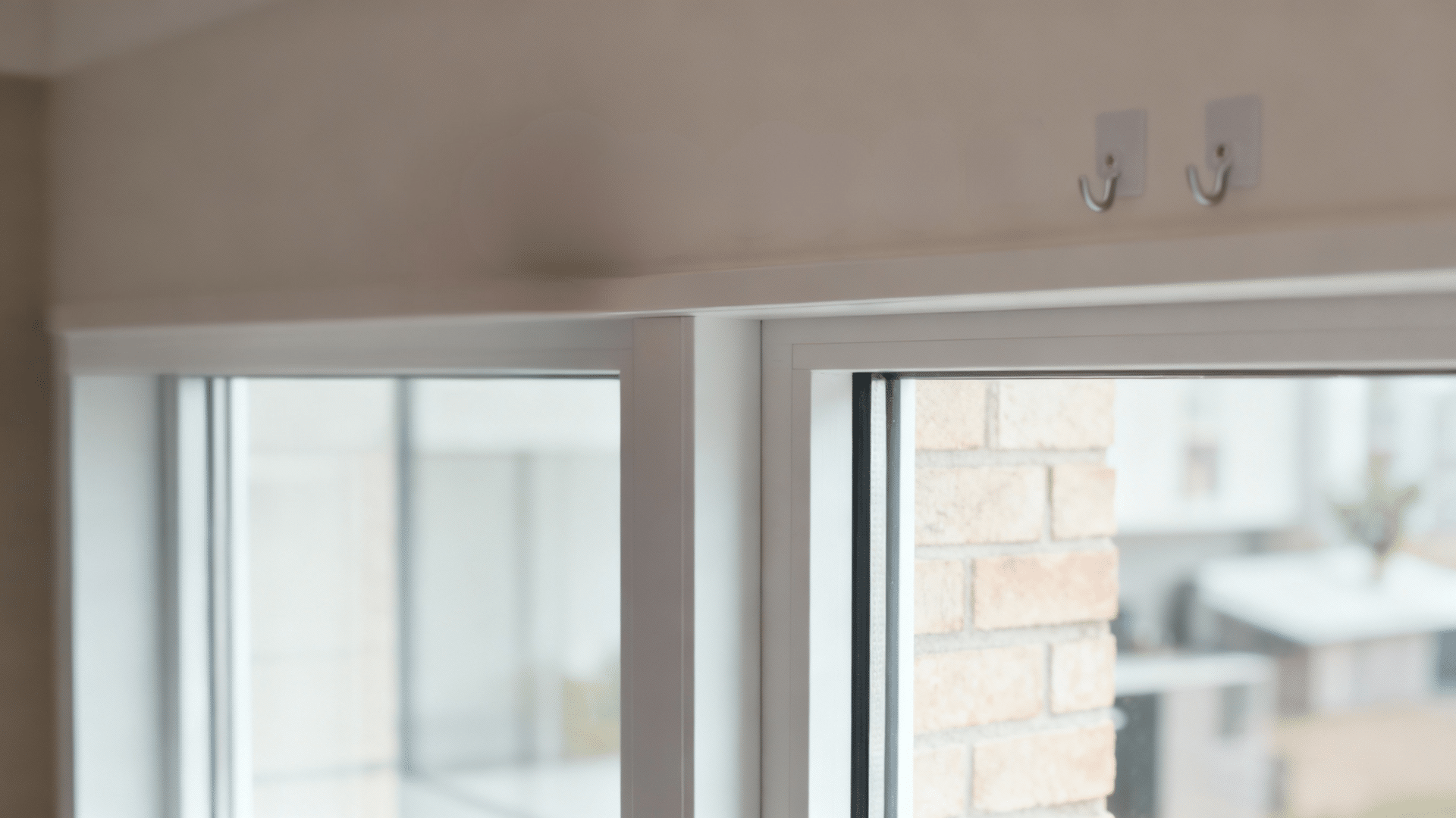 install the adhesive hooks