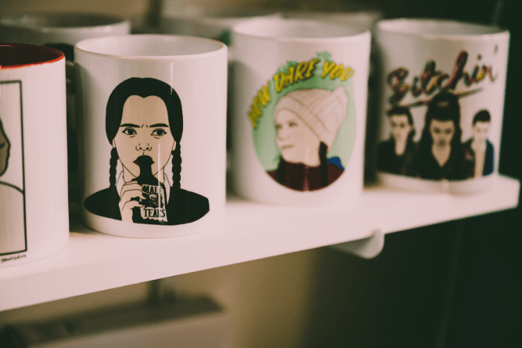 White and Black Ceramic Mug Designs