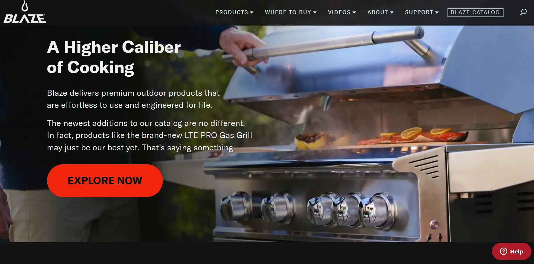 Hand opening stainless steel outdoor grill with cooked salmon and lemon slices on the grill plate