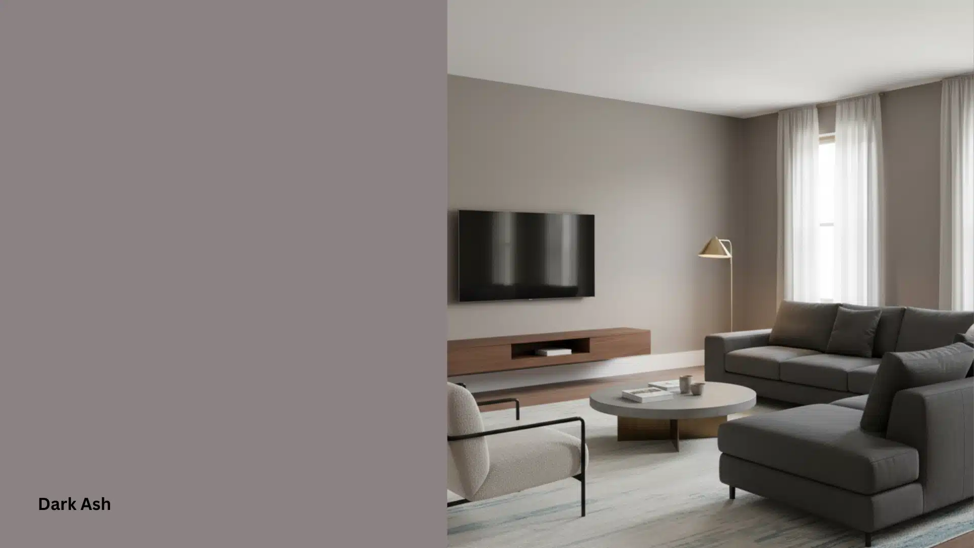 Modern living room with a sofa and a large wall-mounted television next to sheer-curtained windows