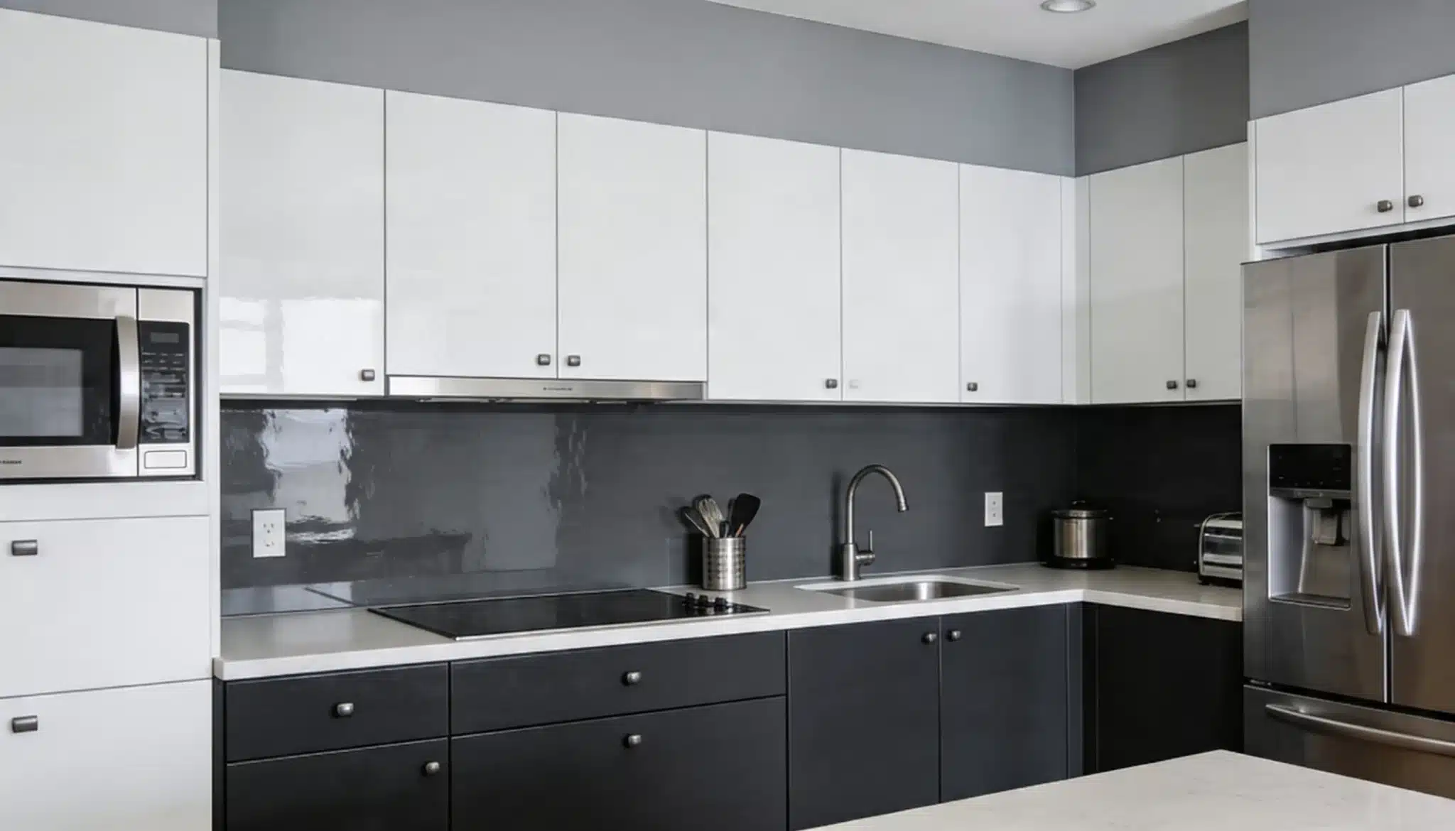 Modern kitchen with two-tone wall in Repose Gray and Peppercorn graphite for a sleek finish