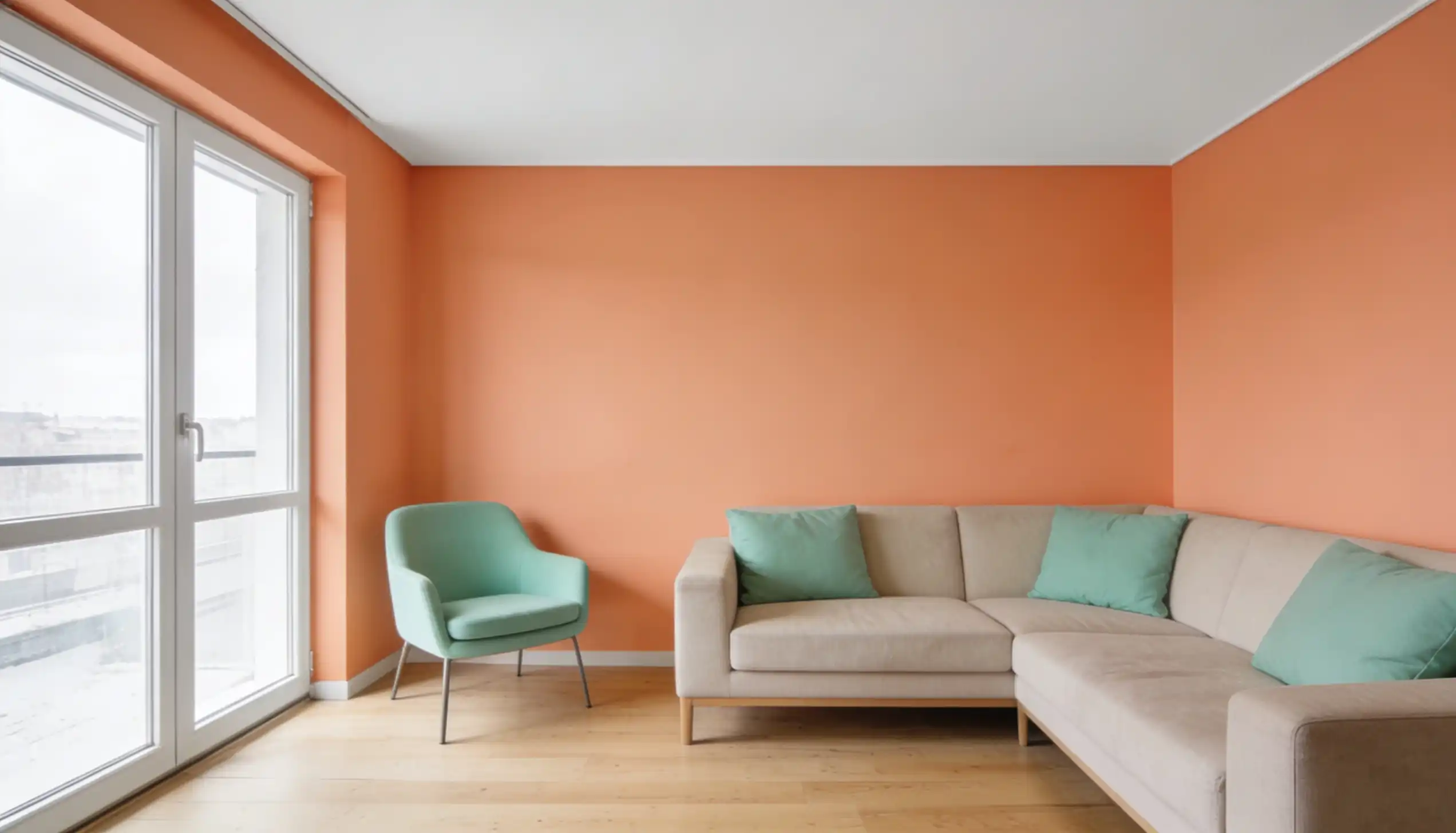 Minimalist living room with salmon-colored walls, light wood floor, beige sectional sofa, a light teal accent chair, and a large white window.