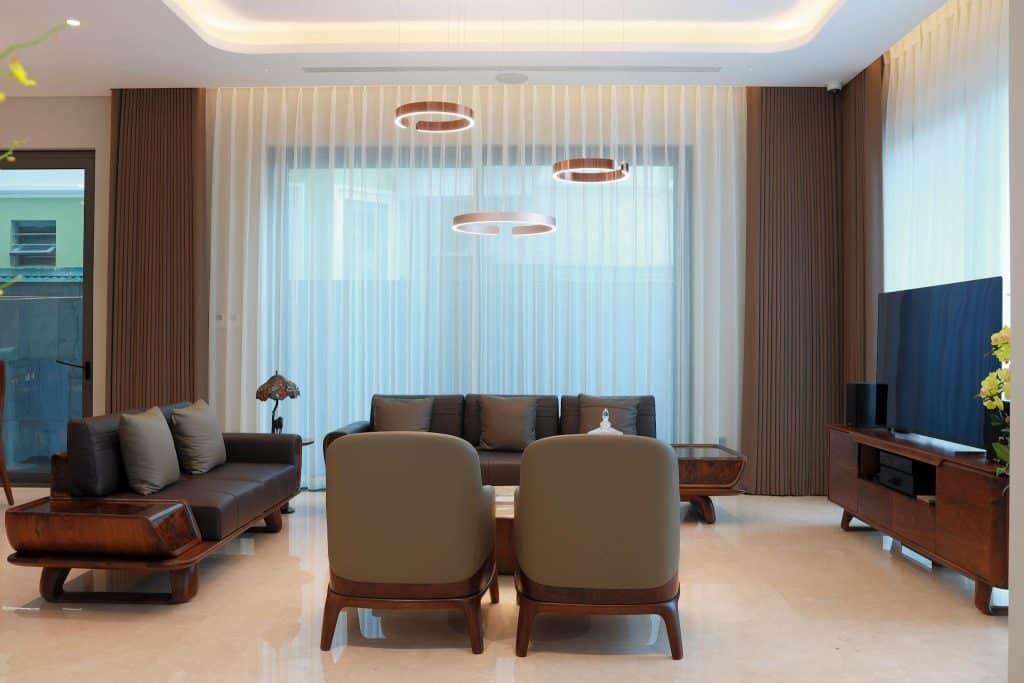 A modern living room with minimalist furniture and soft lighting.