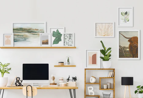 Modern home office with gallery wall.