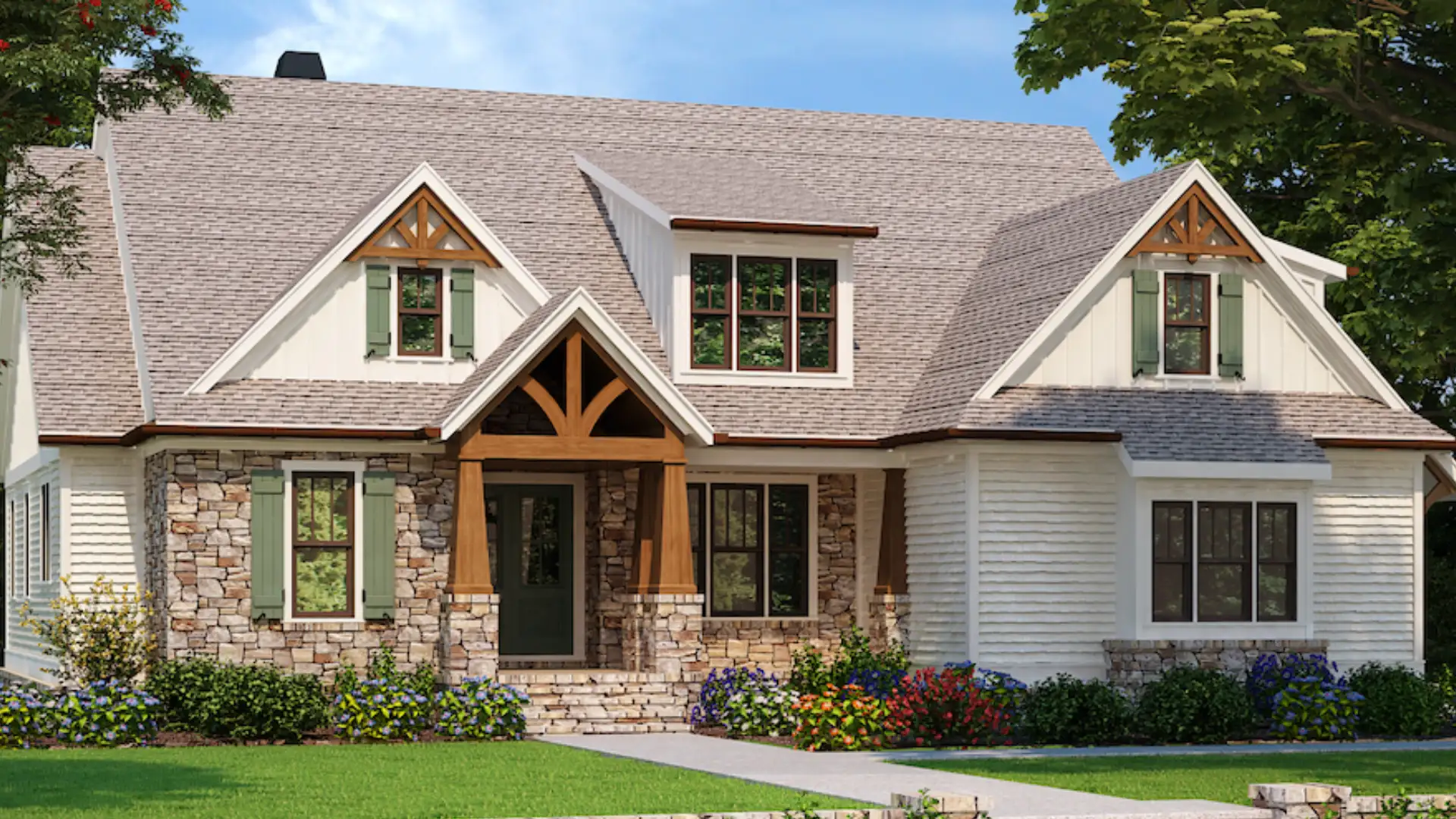 Front exterior of a two-story house with stone and white siding, green shutters, and a covered porch.