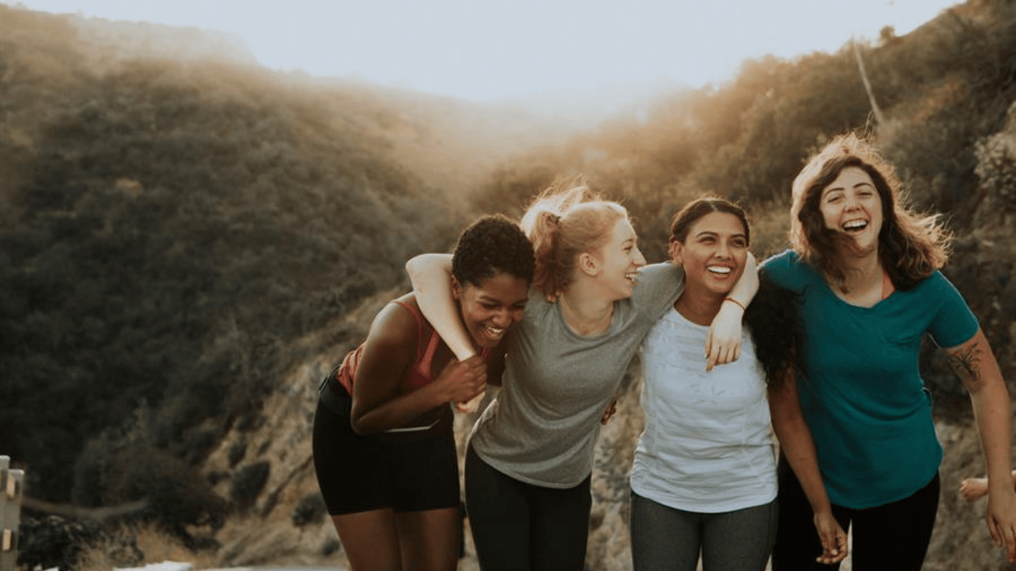 People interacting outdoors showing ways to improve <echighlighted><echighlighted><echighlighted><echighlighted>social wellness</echighlighted></echighlighted></echighlighted></echighlighted>.