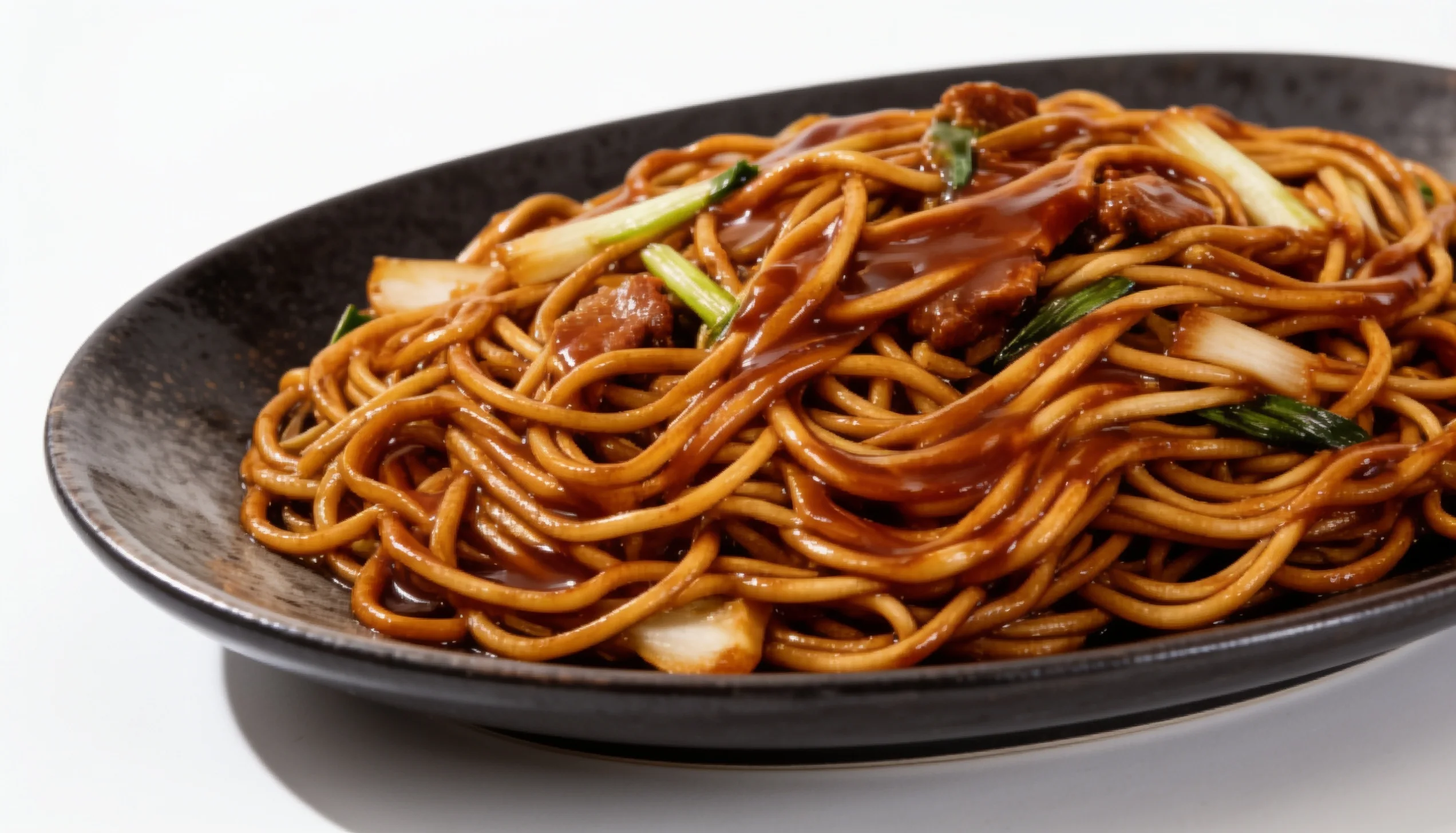 A bowl of <echighlighted><echighlighted><echighlighted><echighlighted><echighlighted><echighlighted>classic soy sauce stir fry noodles</echighlighted></echighlighted></echighlighted></echighlighted></echighlighted></echighlighted> topped with colorful vegetables, showcasing a delicious and hearty meal.