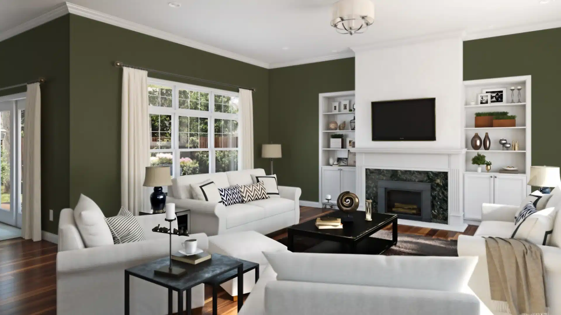 A stylish living room adorned with green walls and elegant white furniture, enhancing the space's contemporary feel