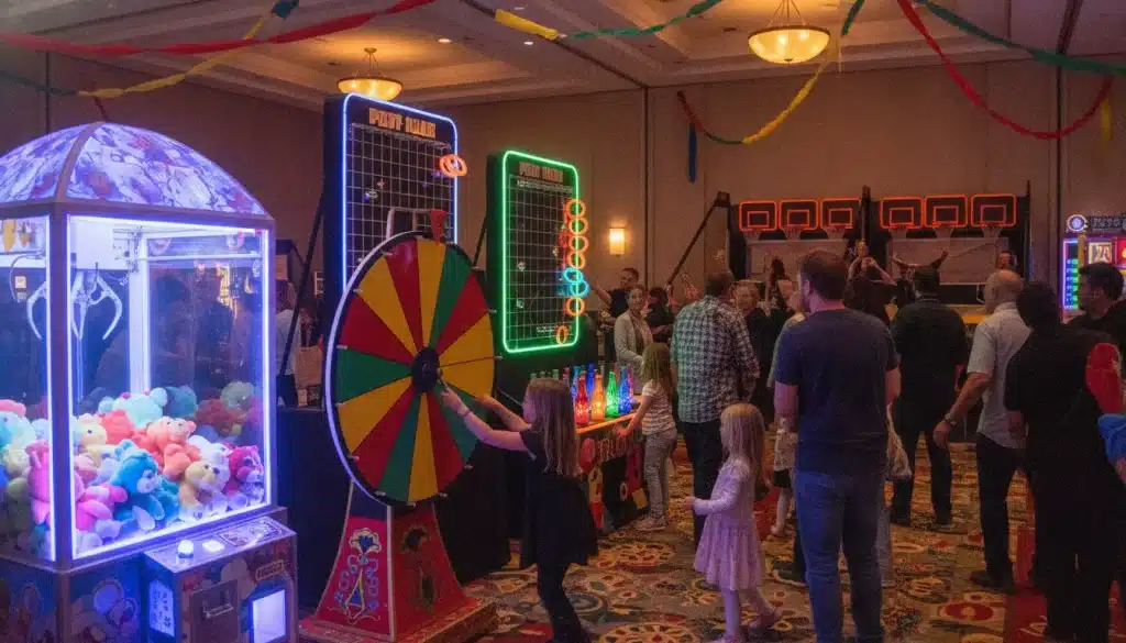 Indoor arcade with claw machine, wheel game, and people enjoying activities in festive setting