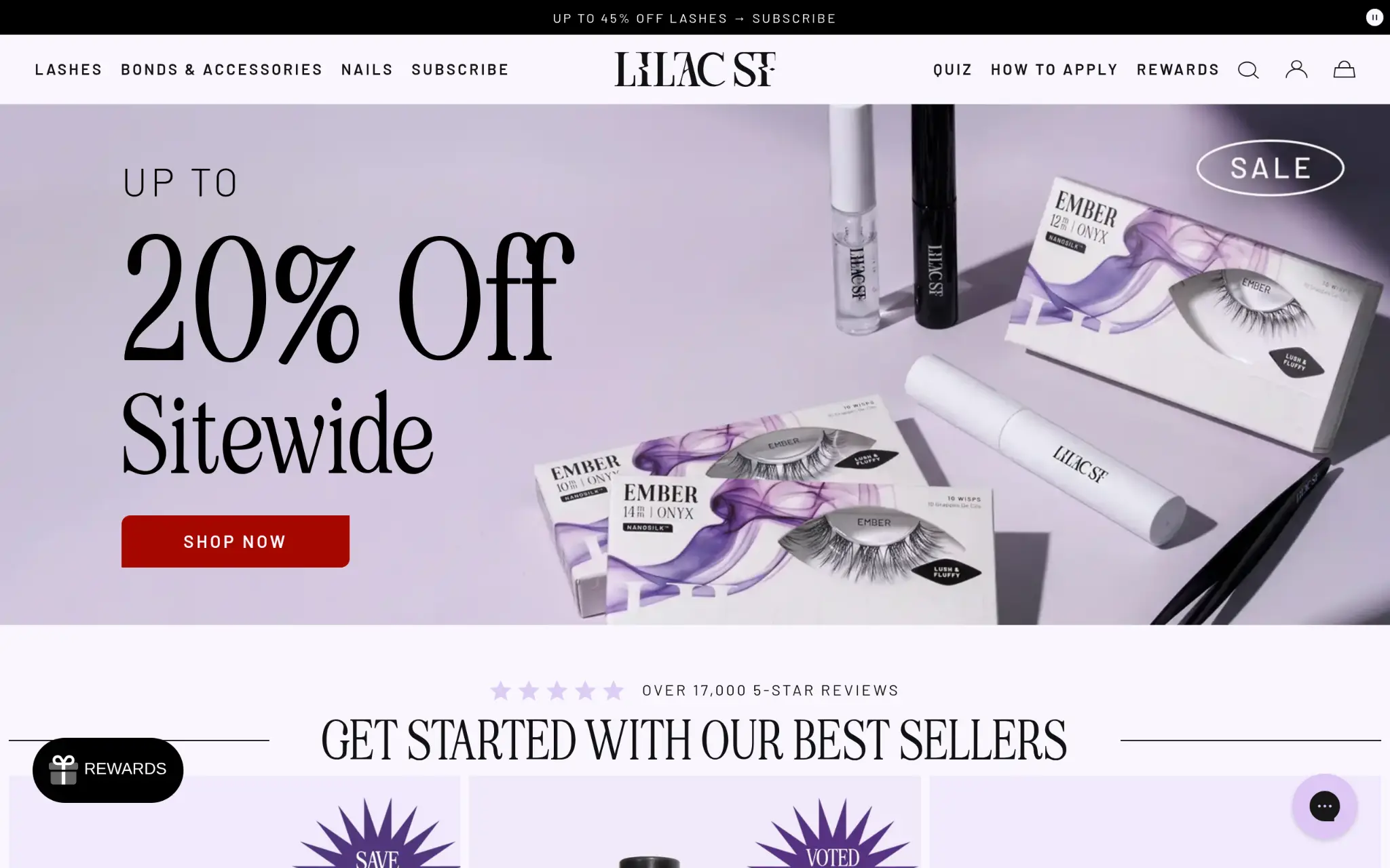 Eyelash products and applicators on purple surface with sale sign