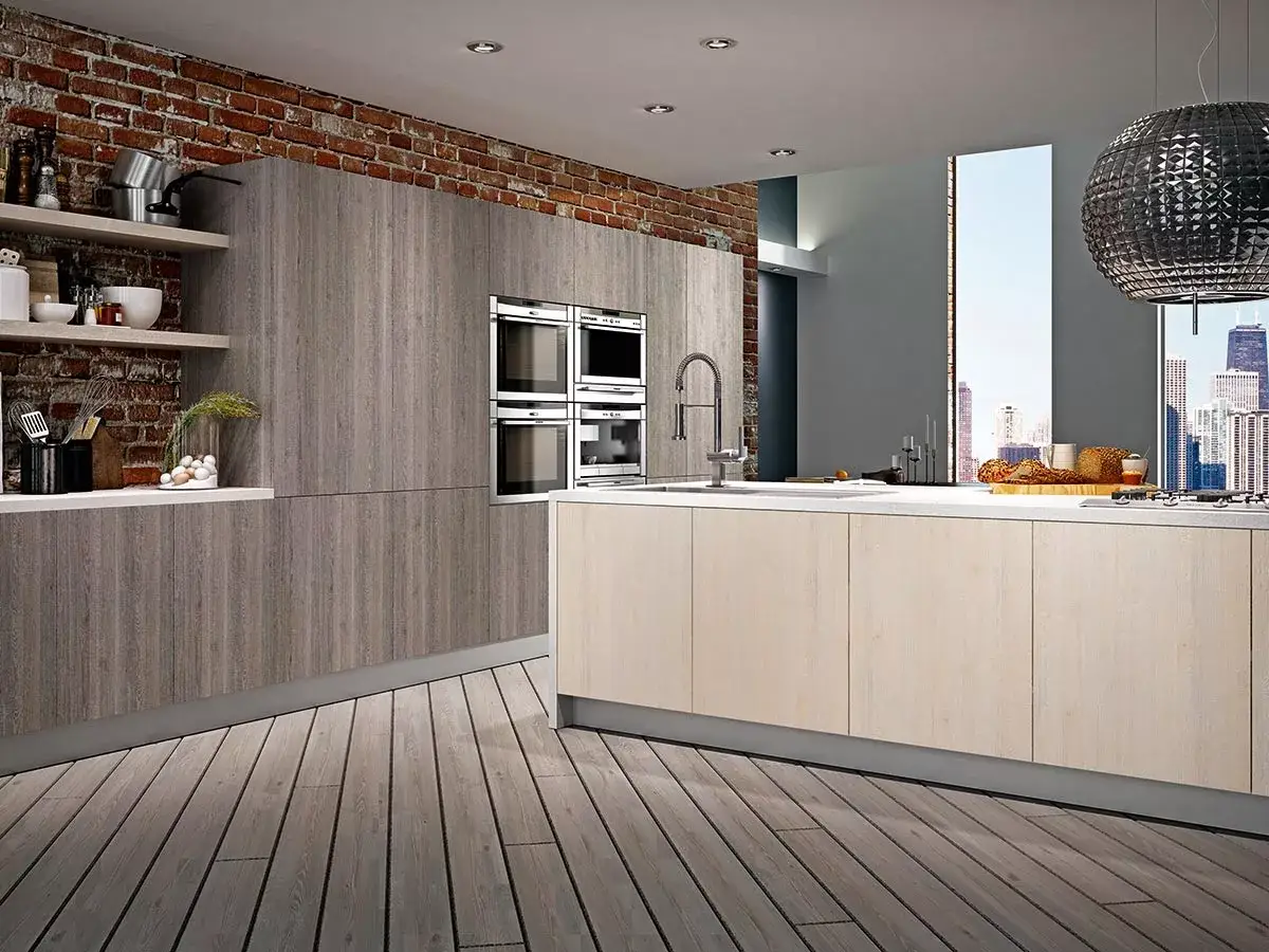 Modern kitchen with brick walls, wooden cabinets, stainless steel appliances, and city skyline view