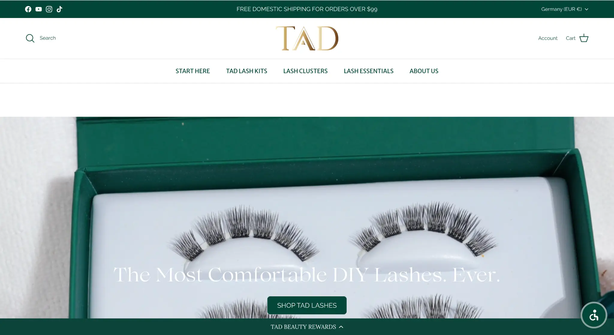 False eyelashes in a green box on a white surface
