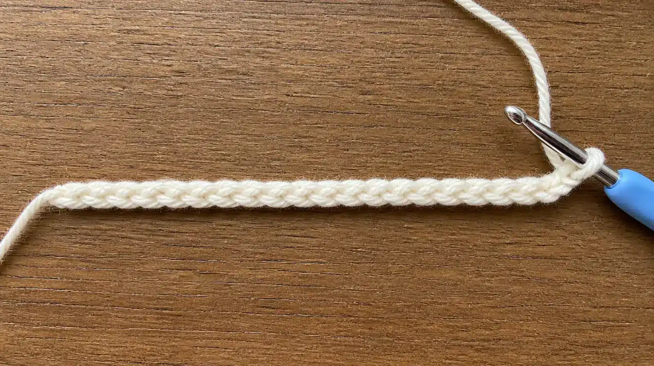 Visual instructions demonstrating the technique for creating a foundation chain in a waffle stitch pattern.