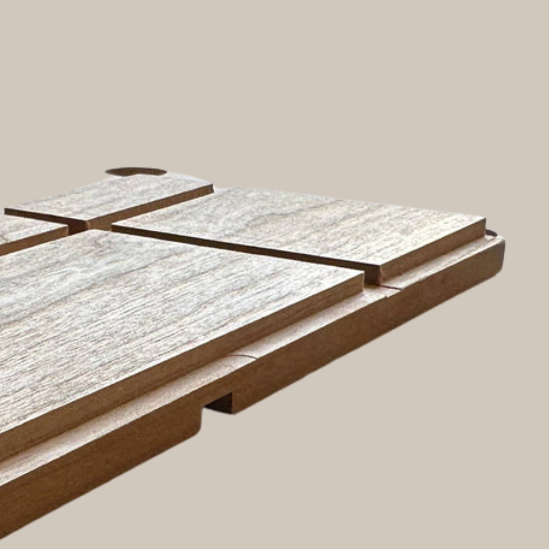 Wood board showing clean grooves and dados cut across the surface